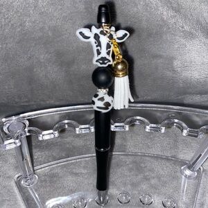 black cow pen,great for stocking stuffers,pen with a few beads and little charm